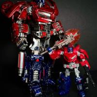 Here is my oversized WFC prime next to teh regular sized toy.